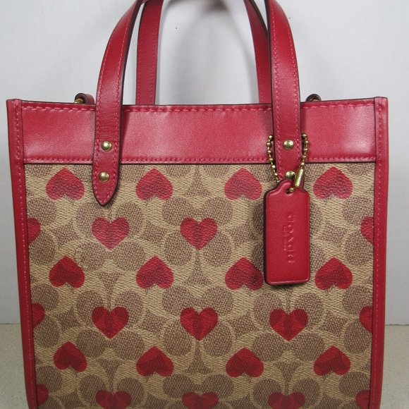 Coach Handbags - Coach Field Tote 22 in Signature Canvas with Heart Print Tan Red Apple